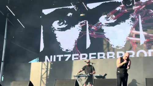/../assets/images/featured/7vI0BN3SkvA_Nitzer-Ebb-Join-in-the-Chant-Live.jpg