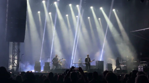 /../assets/images/featured/L6fcXvyrips_Interpol-Slow-Hands-Live.jpg